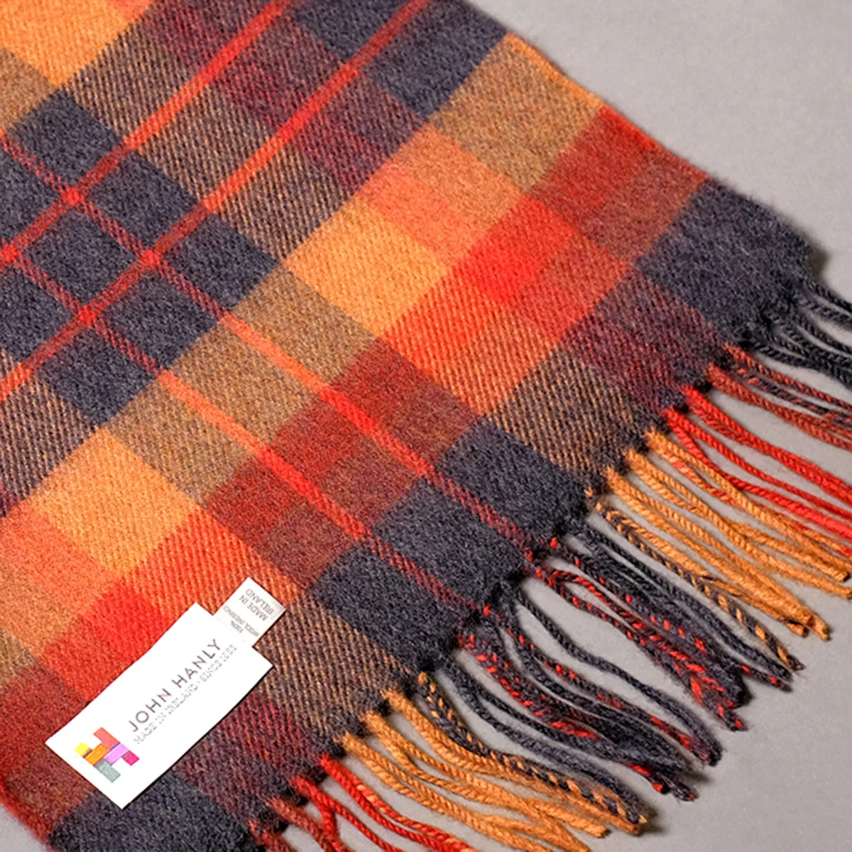 Pure merino wool scarf in orange and grey check